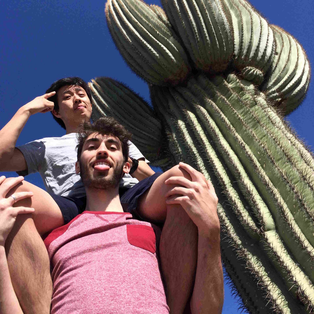 Noah and Andrew can't quite match the height of the Saguaro cactus!